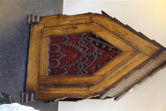 Carrew & Rule, Fenchurch Street, London. A Victorian Gothic design oak hour repeating bracket clock, clock 21in., bracket 15.5in.